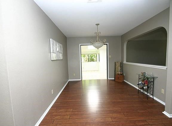 Large formal dining opens to the family, living room and kitchen.