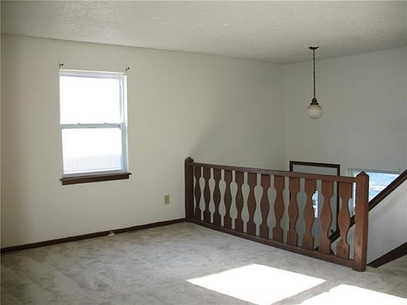 4th image of 10307 E 39th Ter #9