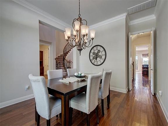 An elegant formal dining room is located off of the foyer and has easy access to the kitchen.