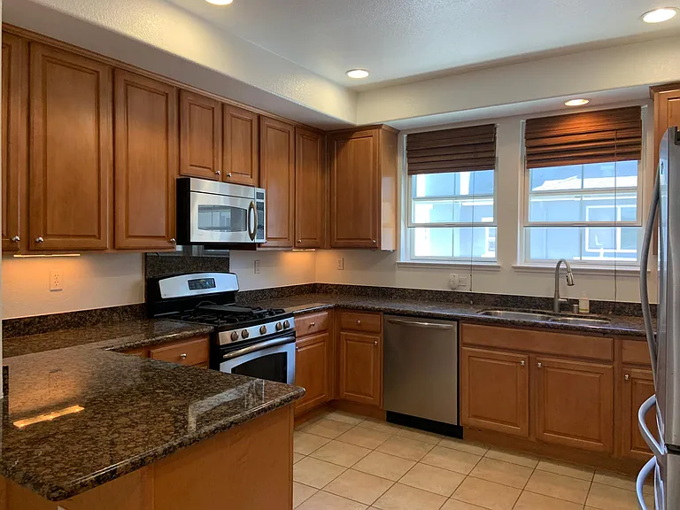Gourmet kitchen with granite countertops.