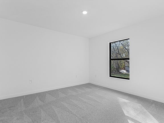 Rest and relaxation await in the master bedroom