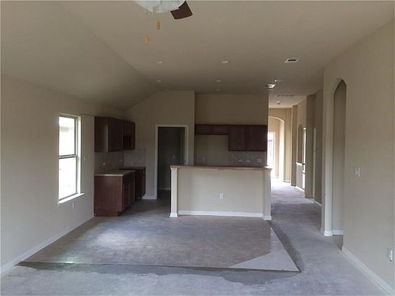 Open floor plan from living room to spacious kitchen with island.