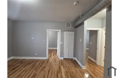 6055 S Peoria St #3 Photo 1