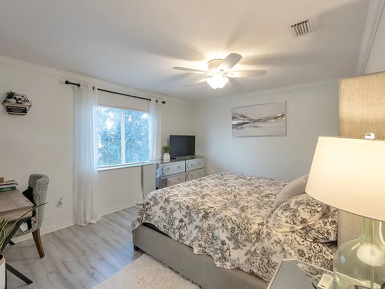 Option #1: Primary bedroom with ensuite bathroom.