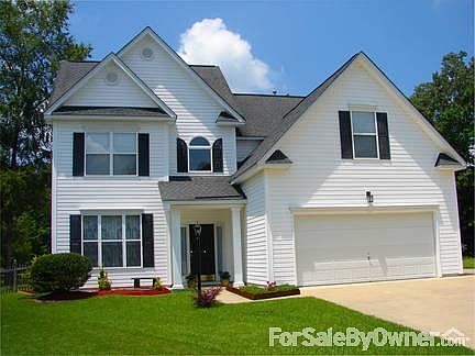 Front of House
						:
						Extended concrete parking pad to the right of garage for additional parking.