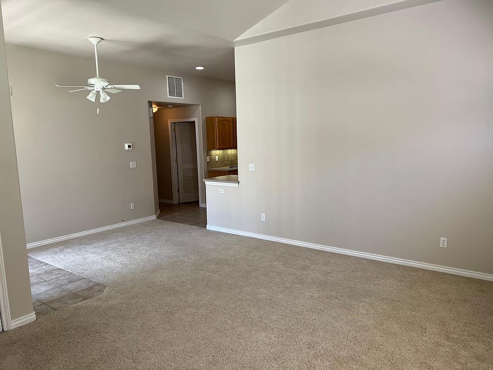 Living room looking toward kitchen and hallway