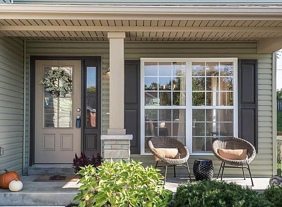 Sit and relax on the front porch with a beverage.