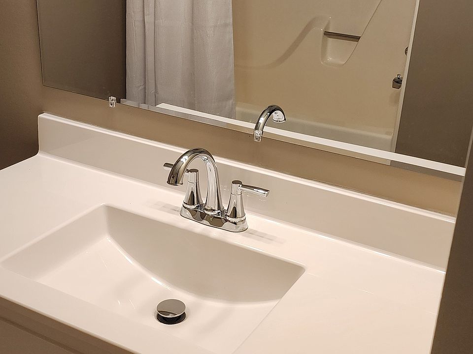 Vanity Top and view of tub from mirror