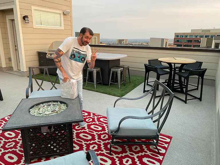 Rooftop Deck with views of Downtown Denver. Gathering area with firepit, Bistro Table, Barbecue & Fire Island Firepit