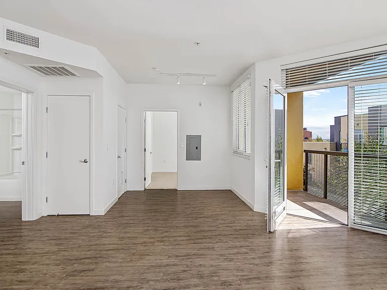 Living Room with Balcony and Hard Surface Flooring
