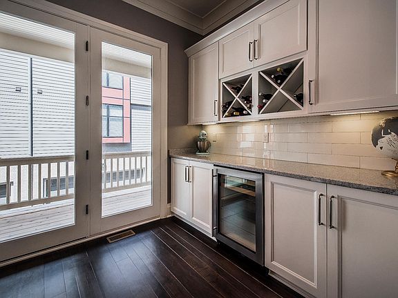 Bar area adjacent to kitchen with professional grade bevera