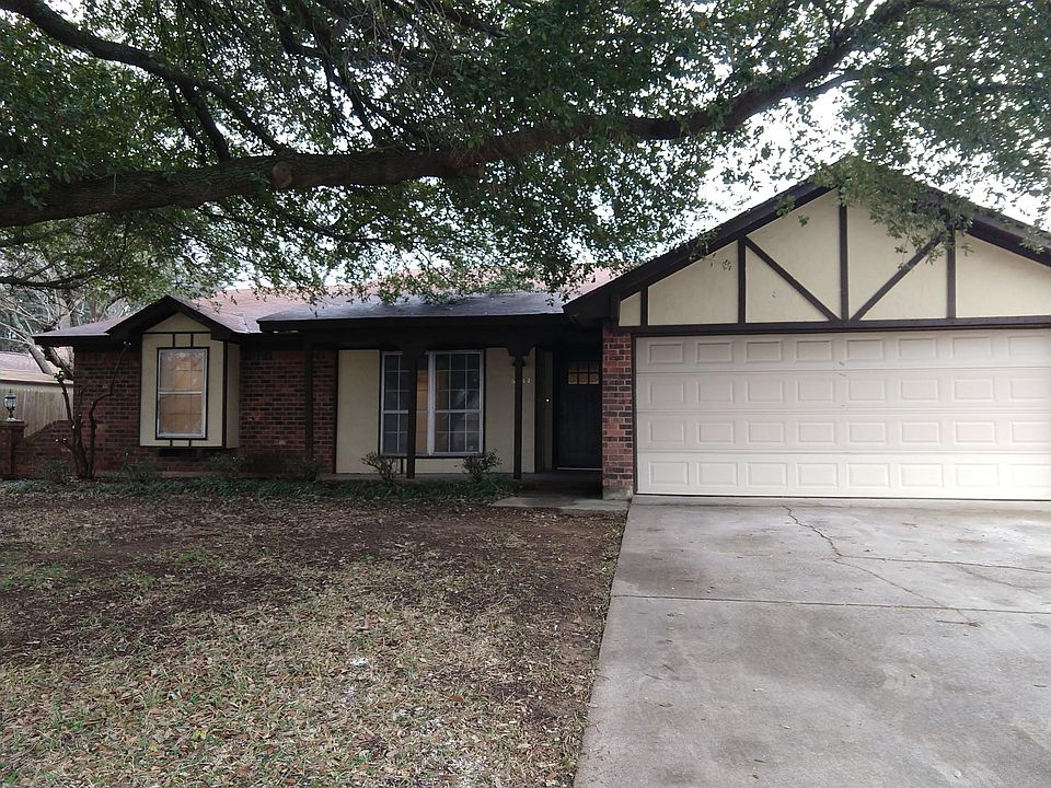FRONT OF THE HOME: New Landscaping is to come soon.
TWO CAR GARAGE with garage door opener