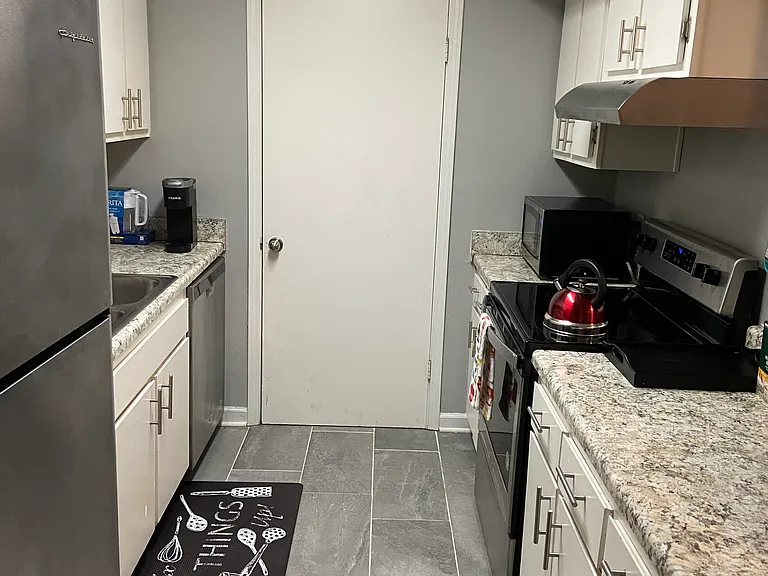 Kitchen
Door leads to laundry room