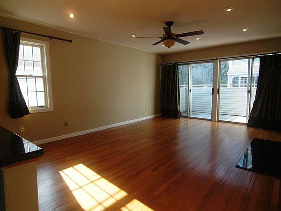 Living Room w/fireplace, sliding doors to deck