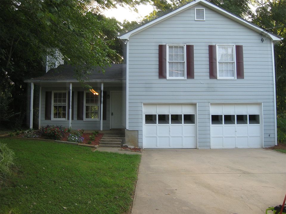 2 CAR FRONT ENTRY GARAGE WITH GARAGE DOOR OPENERS