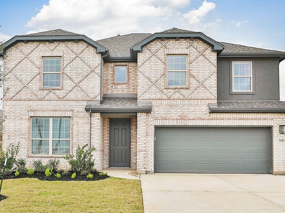 Stunning brick facade and modern design at 3018 Myrtle Beach Lane in Coastal Point.