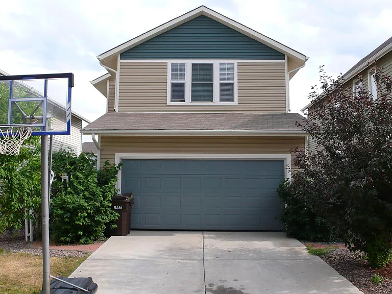 Alley access to attached garage. NOTE: this home does not have a fenced yard