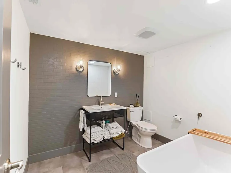 Downstairs bathroom with huge soaking tub