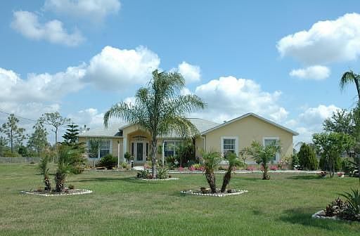 House on One Acre with landscaping