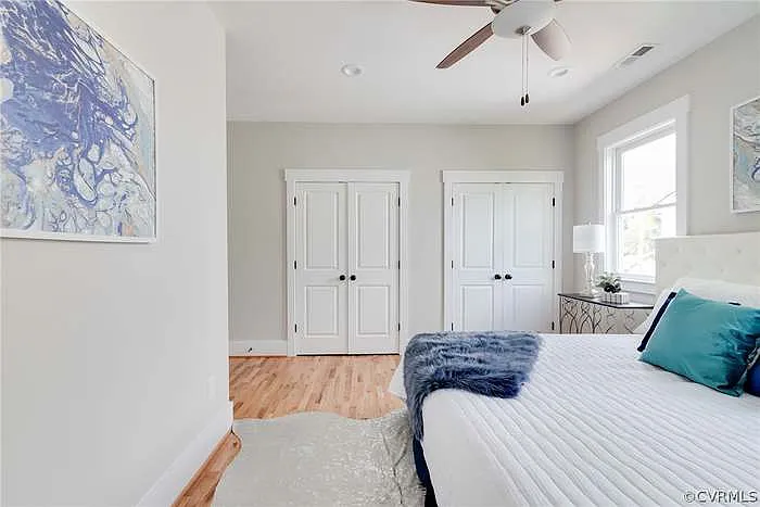 Double closet in primary bedroom.