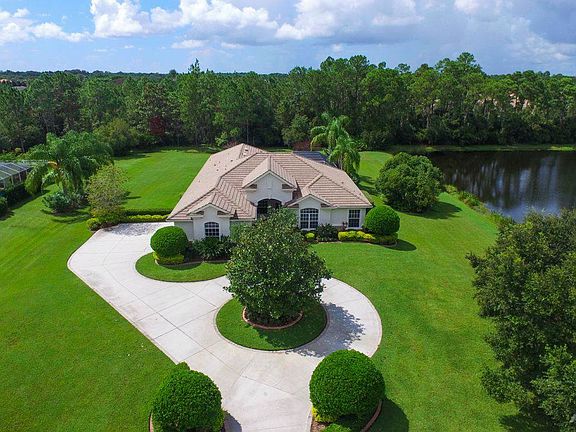 5 fabulous bedrooms, 4 beautiful bathrooms, formal dining, sitting, plus an oversized family room- and that setting! It's impossible to replicate.