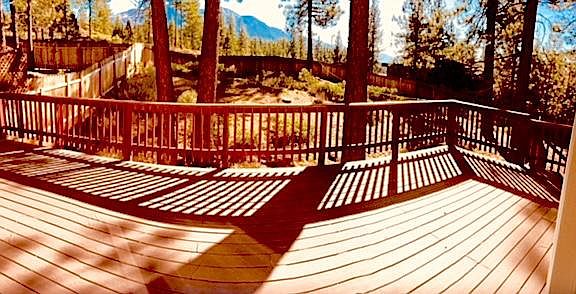 Rear deck with mountain views