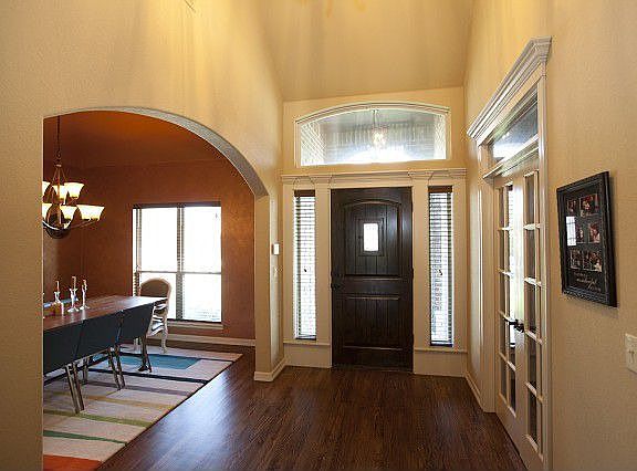 Entry with gleaming hardwoods