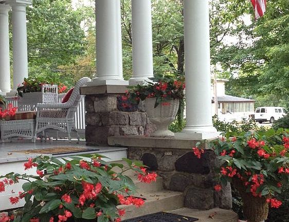 Summer view of the side entry to the front porch!