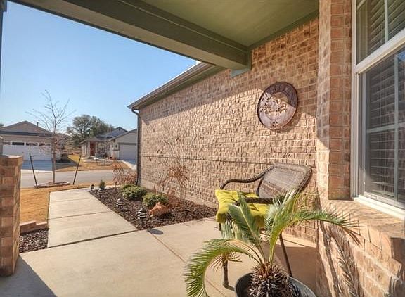 The bayed Breakfast Nook views the Front Sitting Porch.