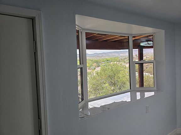 Livingroom family room Bay window with operable side windows