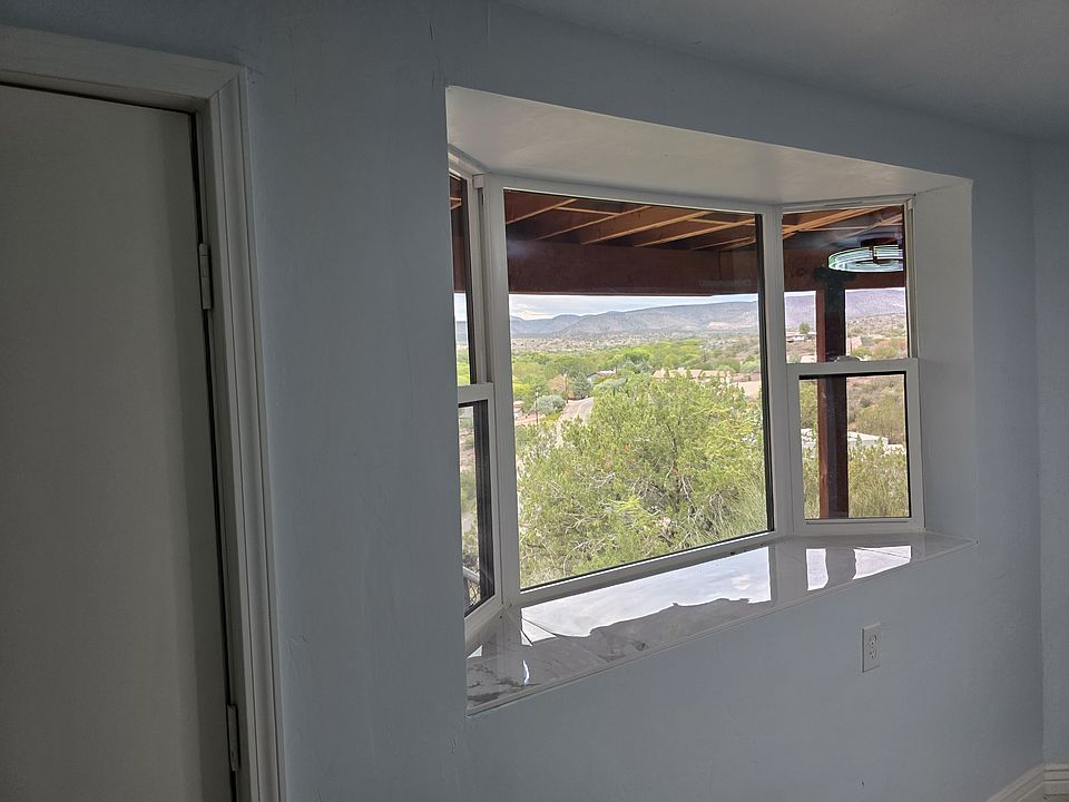 Livingroom family room Bay window with operable side windows