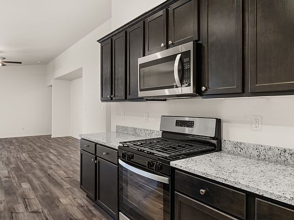 The kitchen comes with brand-new stainless-steel appliances