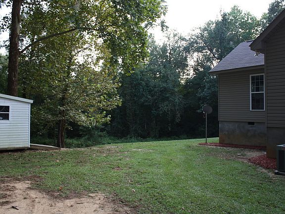 Back Yard
						:
						16x20 Storage building included w/ ramp, Will hold lawn mower and 4-wheeler