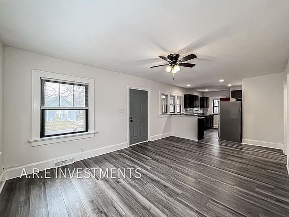 New LVP Flooring throughout the main level living room, kitchen, and hallways