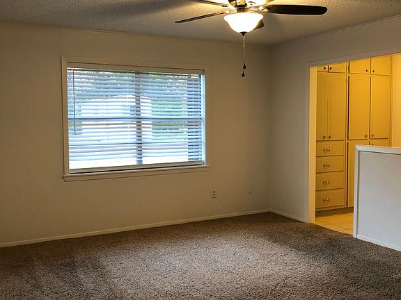 Master bedroom with dressing area and full bath with new tile shower , new lights,faucets and toilet