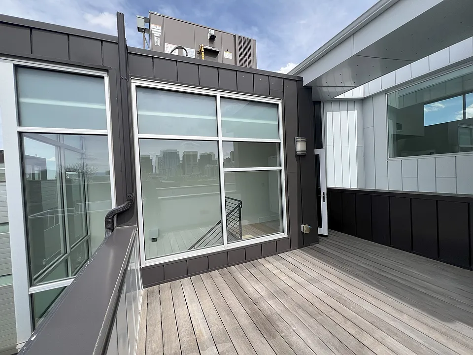 Fourth floor deck looking back at glass enclosed staircase