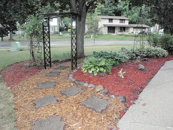 Professionally landscaped all around the exterior of the home.