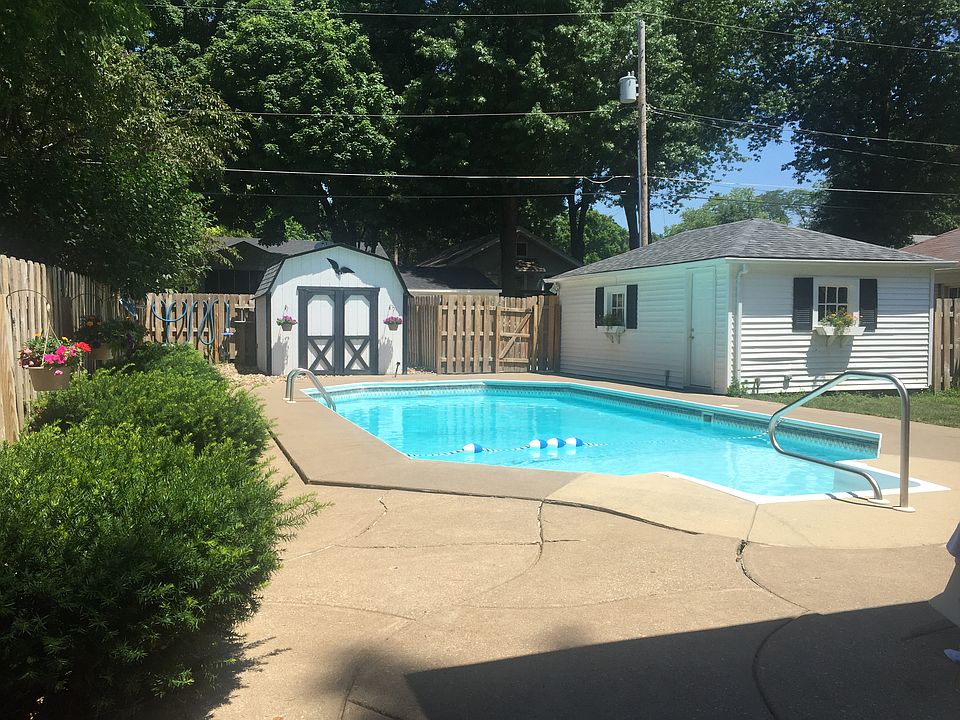 Swimming pool, shed, garage.