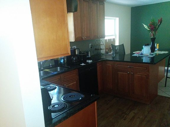 Kitchen
						:
						Granite Counter and custom Cabinets