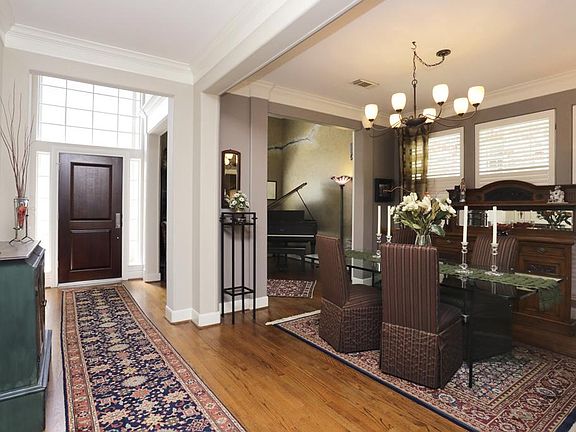 FRONT ENTRY INTERIOR VIEW. Notice the spacious entry and hallway.
