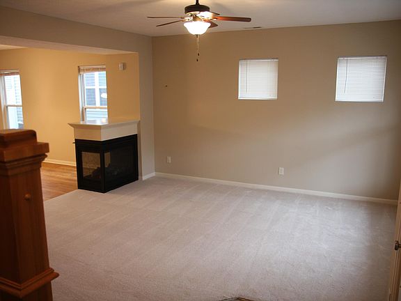 Living room with dual sided gas fireplace