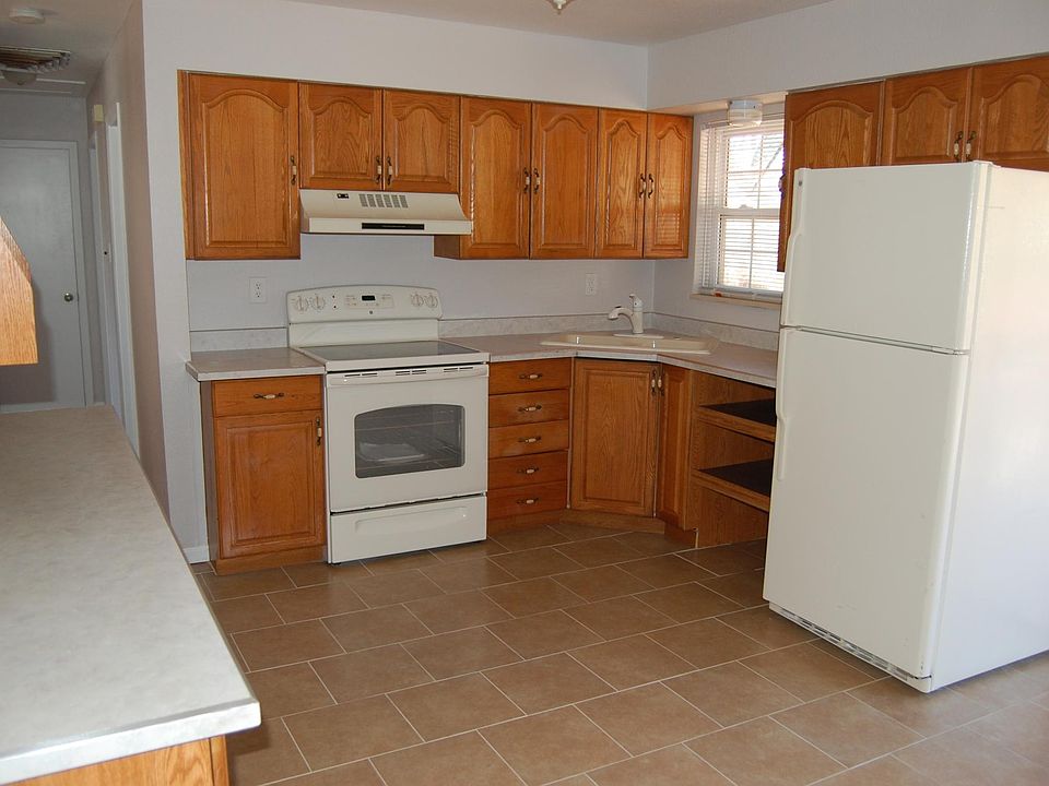 Kitchen, slider is to the right of the frig
