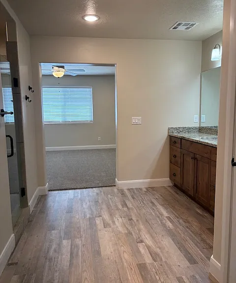 master bathroom with room view