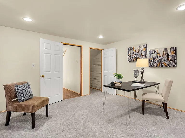 Newer carpet on main and top floors.