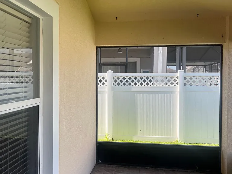 45 - View from the backyard into the enclosed patio area.