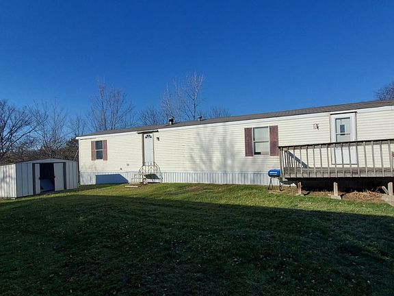 Side view of home in the front yard