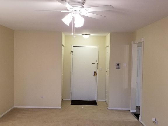 ENTRANCES TO CONDO, LIVING ROOM, BEDROOMS AND KITCHEN