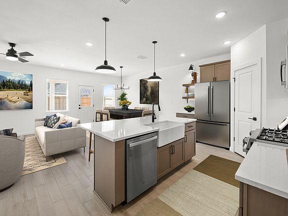 Kitchen with white apron-front sink
