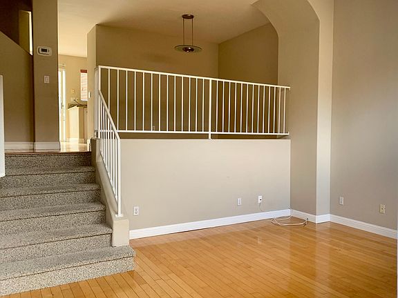 Living Room looking towards the Dining Room & Kitchen (where half bath is located)