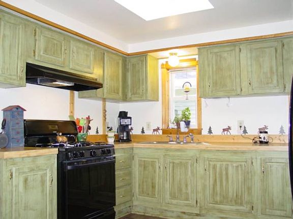 The kitchen is updated with tons of storage.